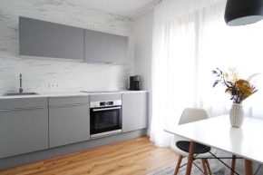 Apartment mit Schwimmbad und Privatparkplatz